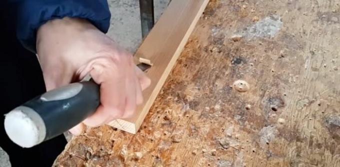 Carefully remove a piece of wood with a chisel, but not completely