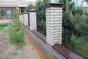 Fence with brick pillars. Tips on building