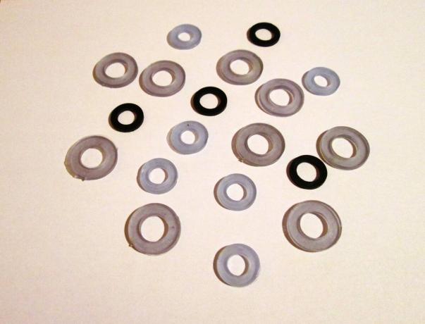 Rubber gaskets (black) and transparent silicone).