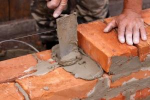 Calculating the number of bricks for the construction of