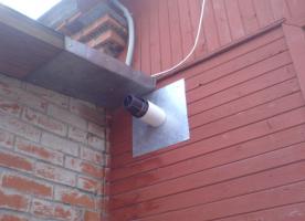 Heating a private house (ventilation device in the boiler)