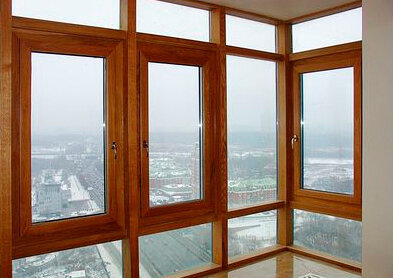 Wooden panoramic windows in high-rise