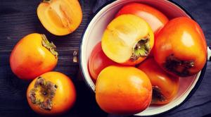Who should not eat a persimmon?