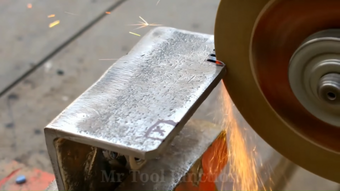 The process of cutting the marked portion of the preform metal