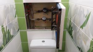 Toilet replan pipes to mask