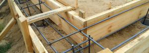 Sand bed for strip foundation - whether it is necessary?